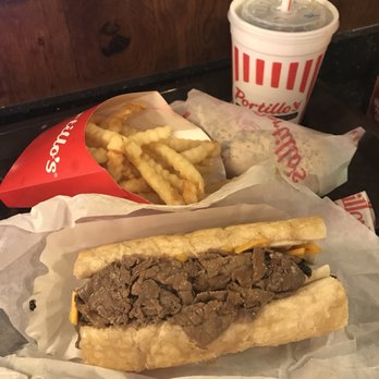 Portillo's Normal - Italian beef/ sausage combo with cheddar cheese, fries and Chicago dog. - Hot Dogs Near Me - Normal, Illinois Portillo's Normal - Italian beef/ sausage combo with cheddar cheese, fries and Chicago dog. - Hot Dogs Near Me - Normal, Illinois