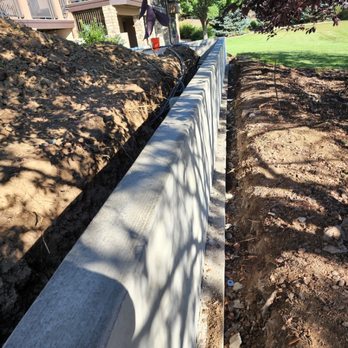 Andy Handy Maintenance & Concrete - Concrete retaining wall to hold back dirt - Masonry/Concrete Near Me Andy Handy Maintenance & Concrete - Concrete retaining wall to hold back dirt - Masonry/Concrete Near Me