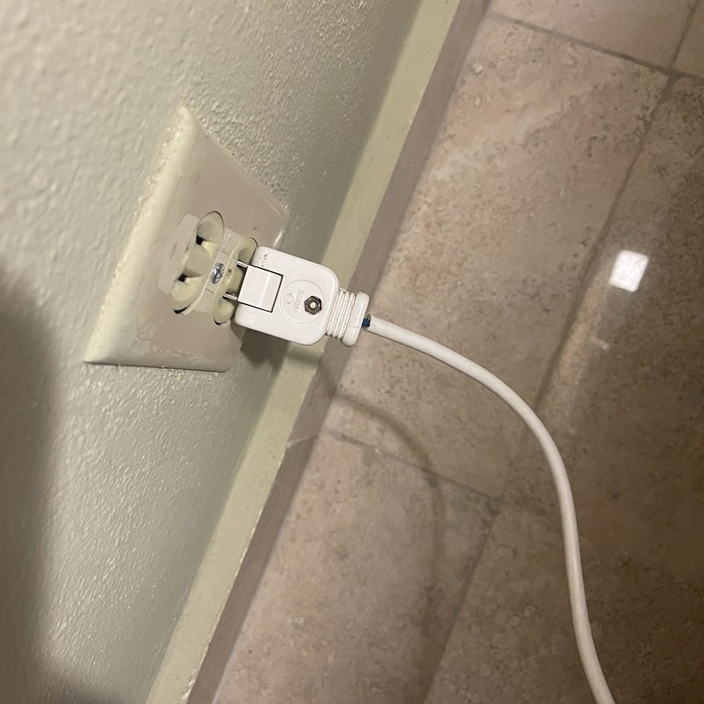 Mold, cracked showers, outdated power outlets, dirty light switches, construction leftovers/paint chips in our yard....