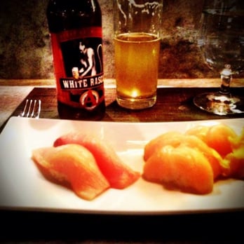 One Flew South - White Rascal Beer with hamachi and hotate. - New American Near Me - Atlanta, Georgia