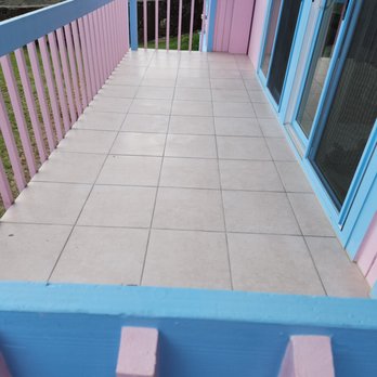 The Grout Doctor - Honolulu - The finished tile on the first floor lanai. The second lanai is directly above this one and the procedure was the same. - Tiling Near Me The Grout Doctor - Honolulu - The finished tile on the first floor lanai. The second lanai is directly above this one and the procedure was the same. - Tiling Near Me