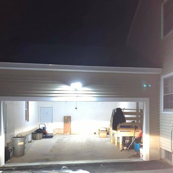 BCS & Sons Construction - a garage in the night - General Contractors Near Me