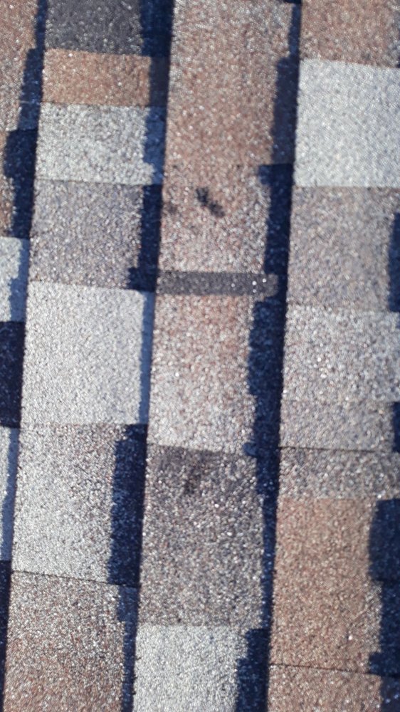 Slide of Quality First Roofing