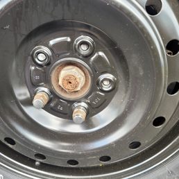 The lugs completely broken off. Mavis had the car over the weekend and put on our spare for some reason and broke off another lug. The lugs completely broken off. Mavis had the car over the weekend and put on our spare for some reason and broke off another lug.