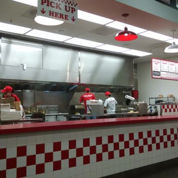 Five Guys - Ok maybe not five guys, but there are two chicks and a dude churning out burgers on a Friday night. - Burgers Near Me - Rio Rancho, New Mexico