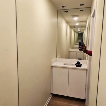 The Kitchen and Bath Studio - Tiny powder room with infinity mirror design. Amazing! - Kitchen & Bath Near Me - Gaithersburg, Maryland The Kitchen and Bath Studio - Tiny powder room with infinity mirror design. Amazing! - Kitchen & Bath Near Me - Gaithersburg, Maryland