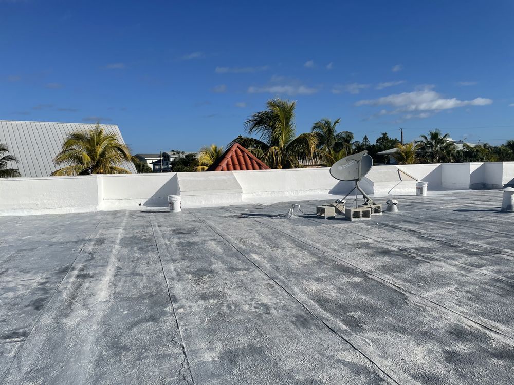 Slide of Andy The Roofer & Co