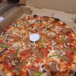 Pizza Jerks - Supreme pizza that was not so Supreme. Soggy crust on the bottom and singed on top. Toppings were on point!