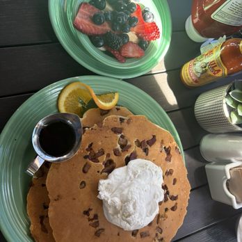 Four Sisters Cafe - Mancakes with fruit and whipped cream on the side - Breakfast & Brunch Near Me - Roseville, California Four Sisters Cafe - Mancakes with fruit and whipped cream on the side - Breakfast & Brunch Near Me - Roseville, California