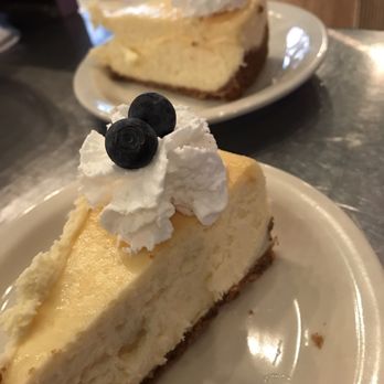 Napoleons Cafe - a slice of cheesecake with whipped cream and blueberries - Cafes Near Me - Oneida, New York Napoleons Cafe - a slice of cheesecake with whipped cream and blueberries - Cafes Near Me - Oneida, New York