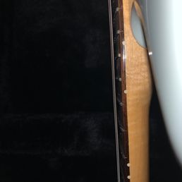 String action is low and comfortable on the high frets, FINALLY! String action is low and comfortable on the high frets, FINALLY!