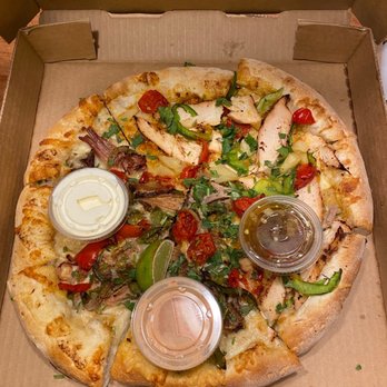 Crafters Pizza and Drafthouse - 1/2 luchador brothers, 1/2 thai island - Pizza Near Me - Carmel, Indiana