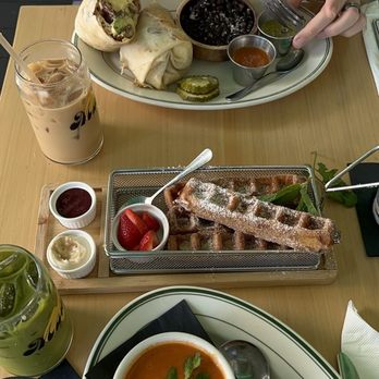 Madi - Surfer Breakfast Burrito, vanilla latte, pistachio matcha, Waffle Churro Sticks, Grilled Cheese Sandwich and tomato soup - Breakfast & Brunch Near Me - San Diego, California Madi - Surfer Breakfast Burrito, vanilla latte, pistachio matcha, Waffle Churro Sticks, Grilled Cheese Sandwich and tomato soup - Breakfast & Brunch Near Me - San Diego, California