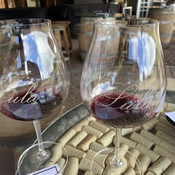 Lula Cellars - Outdoor tasting. Love the cork (under glass) table top - Wine Tasting Room Near Me - Philo, California
