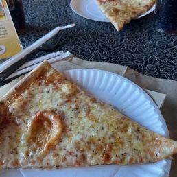 $5.50 for a slice and a drink for lunch. $5.50 for a slice and a drink for lunch.