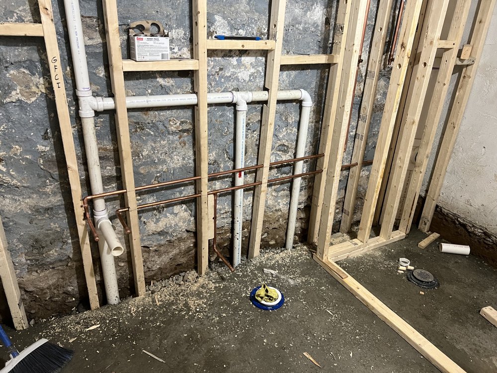 Slide of Family Drain Cleaning