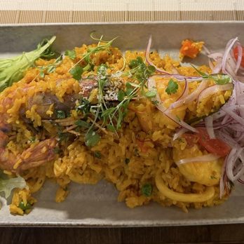 The Nazca Lines - Fried rice with pickled onions, large shrimp, peas, tomatoes and calamari. Very tasty! - Peruvian Near Me - Longwood, Florida