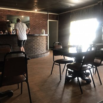 Rollin Smoke BBQ - a man standing in the background - Barbeque Near Me - Johnson City, Tennessee