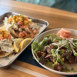 Fish Tacos (left) and Ahi Poke (right) Fish Tacos (left) and Ahi Poke (right)