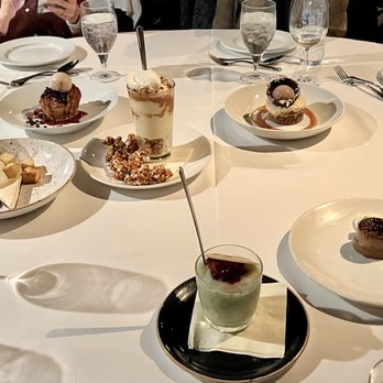 Canoe - All 7 Desserts: German Chocolate Cake, Popcorn Sundae, Sweet Potato Pie, Bread Pudding, Champagne-Pear Sorbet, S'mores, Creme Brulee - New American Near Me - Atlanta, Georgia
