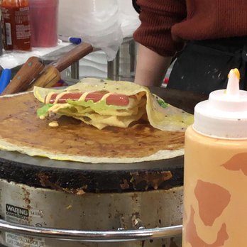 Joe's Steam Rice Roll - Making the Chinese crepe with a hot dog... aka... sausage. - Dim Sum Near Me - Flushing, New York