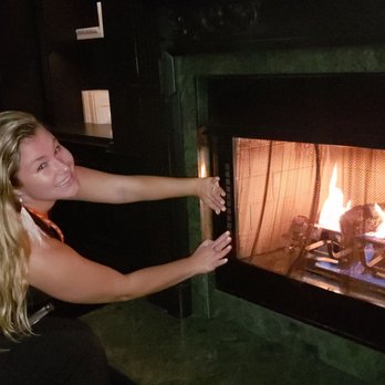 The Commodore - Staying warm from the Miami winter by the fireplace. - Bars Near Me - Miami, Florida