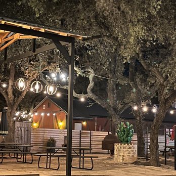 Helotes Beer Garden - a beer garden at night - Beer Bar Near Me - Helotes, Texas