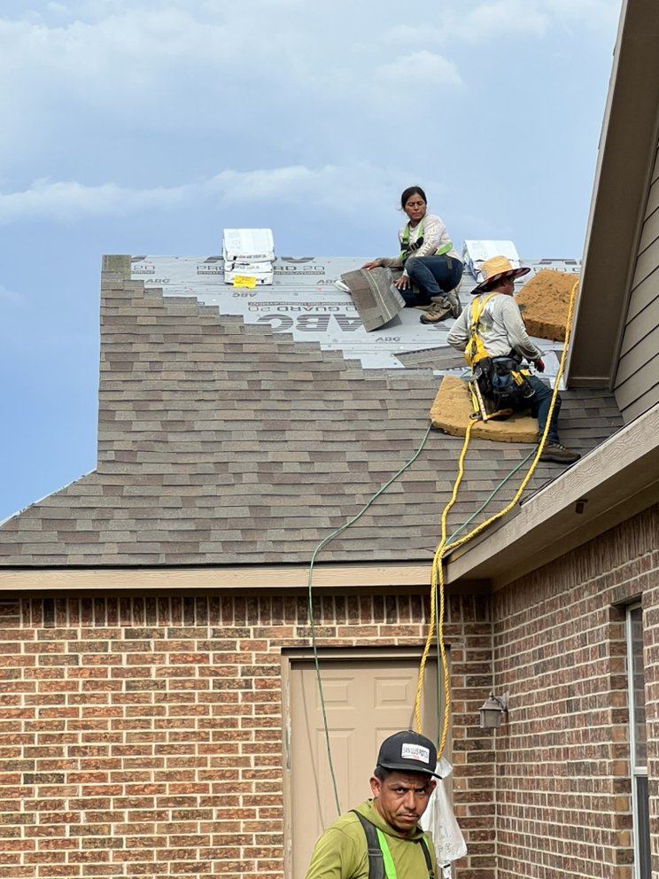 Slide of Davis Roofing Solutions