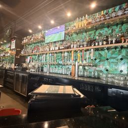 The bar as seen from the end bar stool The bar as seen from the end bar stool