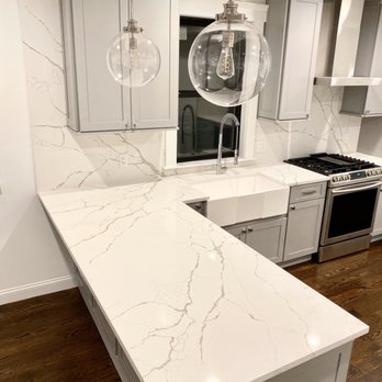 Fresh Countertop - Calacatta Laza kitchen Countertops & full height backsplash project in East Boston. - Countertop Installation Near Me