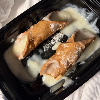 Eatalia Pizza - Melted canoli. They gave it to me from the fridge my guess they fried it and piped it whilst hot - Italian Near Me - Anaheim, California Eatalia Pizza - Melted canoli. They gave it to me from the fridge my guess they fried it and piped it whilst hot - Italian Near Me - Anaheim, California