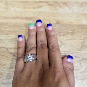 Rainbow Nails & Spa - I love my nails! Showing my seahawks pride and rainbow nails did a fantastic job - Nail Salons Near Me - Beaverton, Oregon