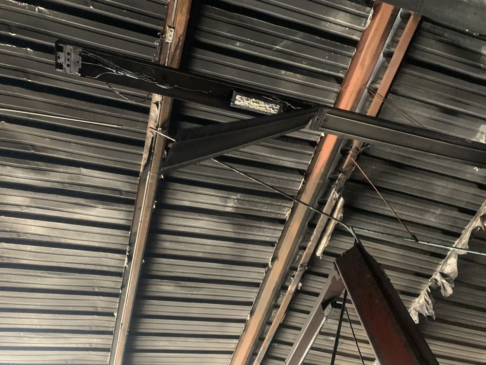 Slide of Structrum Roofing and Construction