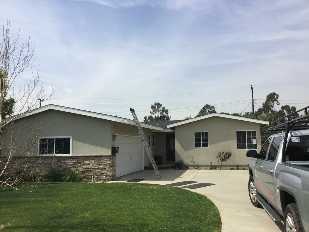 Slide of MA Roofing and Gutters