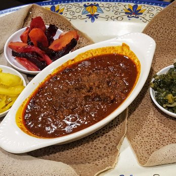 Mesob Ethiopian Restaurant - Mesir wot with sides of cabbage, carrots & beets, and collard greens - Ethiopian Near Me - Minneapolis, Minnesota Mesob Ethiopian Restaurant - Mesir wot with sides of cabbage, carrots & beets, and collard greens - Ethiopian Near Me - Minneapolis, Minnesota