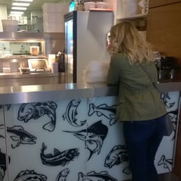 Sophie K. patiently waiting for the fish finger sandwiches!