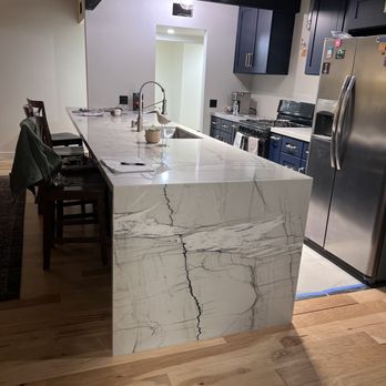 Amazonia Kitchen & Bath - Book matched slabs, waterfall edge - Countertop Installation Near Me