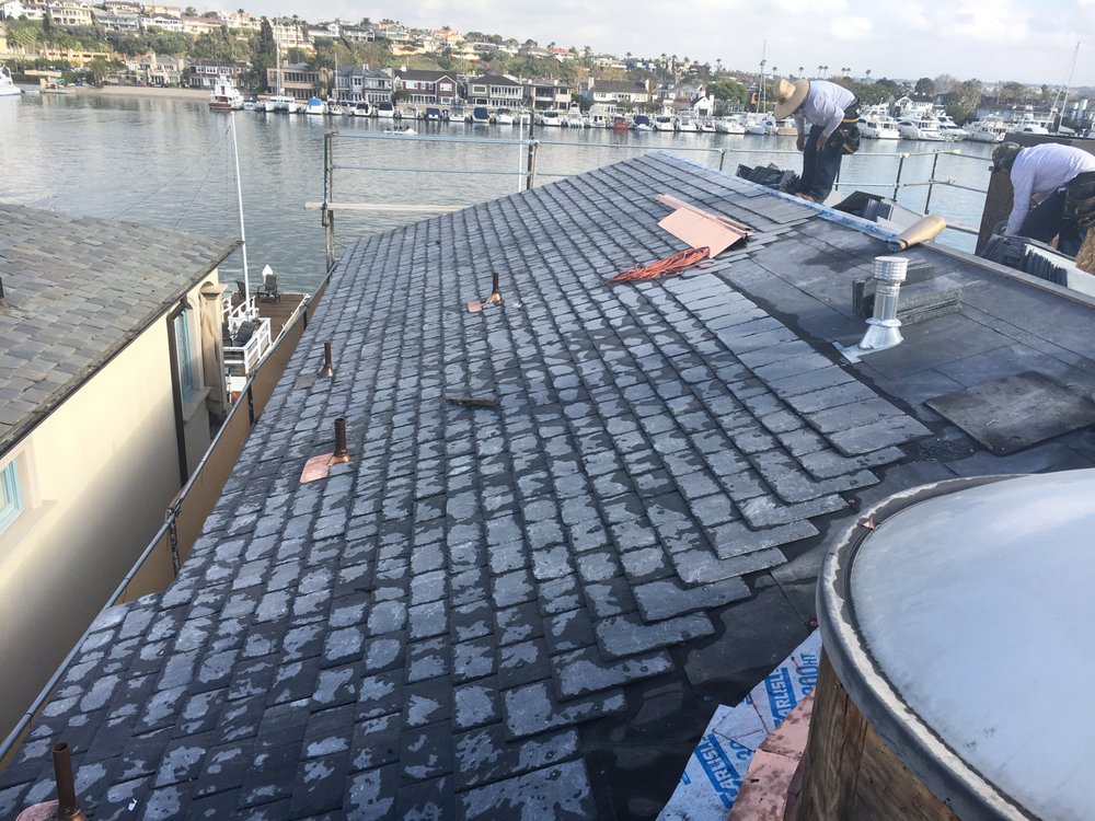 Slide of Lemus Roofing