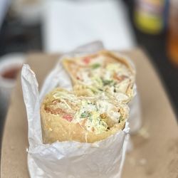 Holé Molé - Fish Ensenada Burrito: Hand Battered Fish, Cabbage, Onion, Tomato, Cilantro, Crema, (NO Rice & Beans) | $11.29
