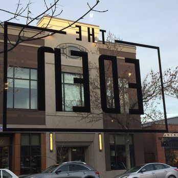 The Eden - cars parked in front of a building - French Near Me - Calgary, Alberta