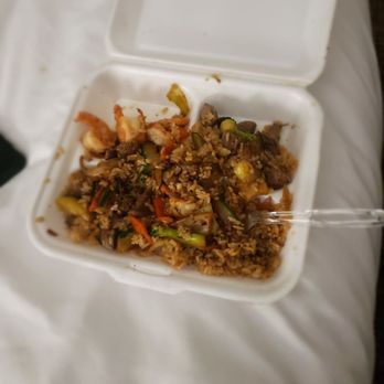 Yamato Steakhouse - a takeout box of food on a bed - Japanese Near Me - Marianna, Florida Yamato Steakhouse - a takeout box of food on a bed - Japanese Near Me - Marianna, Florida