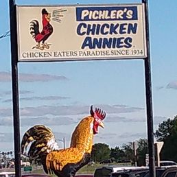 a chicken statue a chicken statue