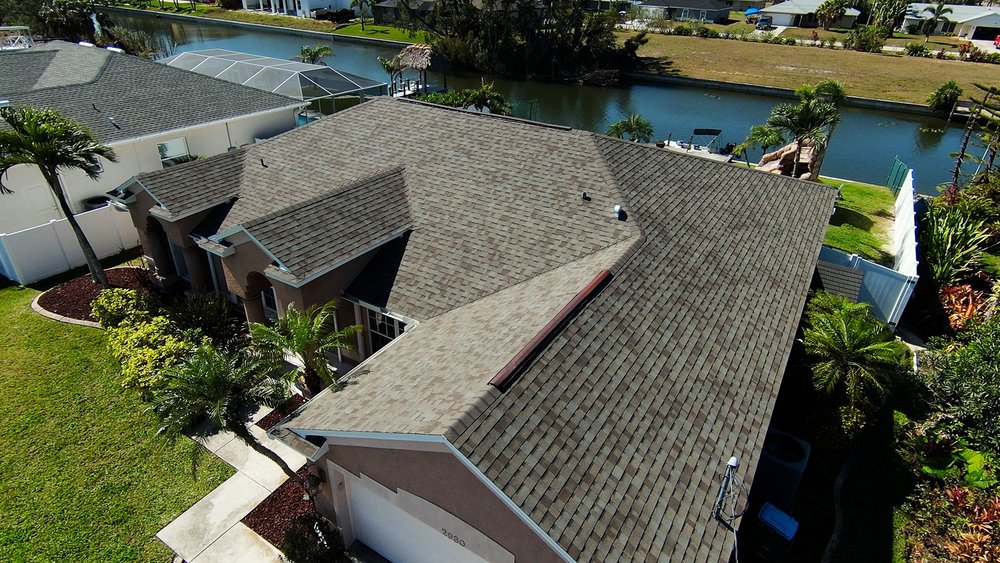 Slide of Four Peaks Roofing