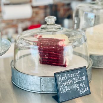 Coastal Baking - a red velvet cake in a glass dome - Bakeries Near Me - Cape Charles, Virginia