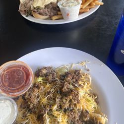 Sippis American Grill & Craft Beer - Philly cheesesteak and taco salad no shell.