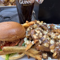 The Thirsty Goose - Spicy fried chicken with poutine.