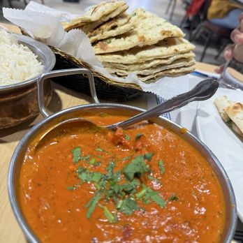 Everest Curry Bar & Grill - Butter Chicken Garlic Naan - Indian Near Me - Houston, Texas Everest Curry Bar & Grill - Butter Chicken Garlic Naan - Indian Near Me - Houston, Texas
