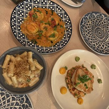Bottiglia - Top clockwise: Lobster ravioli, chilean sea bass on risotto, truffle mac n' cheese - Italian Near Me - Henderson, Nevada Bottiglia - Top clockwise: Lobster ravioli, chilean sea bass on risotto, truffle mac n' cheese - Italian Near Me - Henderson, Nevada