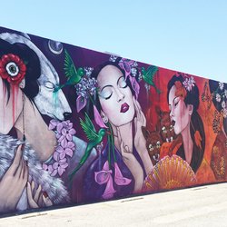 ArtHatch - 140 Foot mural on the side of ArtHatch building by artist Amandalynn