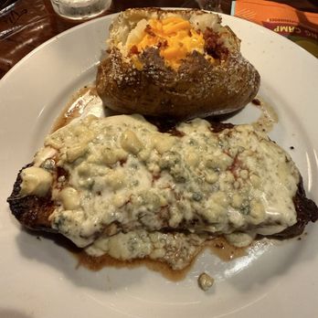 LongHorn Steakhouse - New York Strip w/ bleu cheese crust and Loaded Baked Potato - American Near Me - Henderson, Nevada LongHorn Steakhouse - New York Strip w/ bleu cheese crust and Loaded Baked Potato - American Near Me - Henderson, Nevada